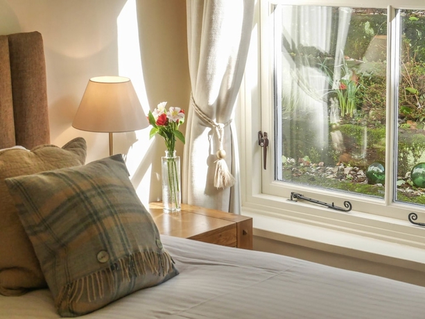 Imagen de la habitación del Hotel The Pierhouse. Foto 17