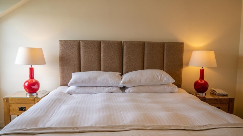 Imagen de la habitación del Hotel The Pierhouse. Foto 18