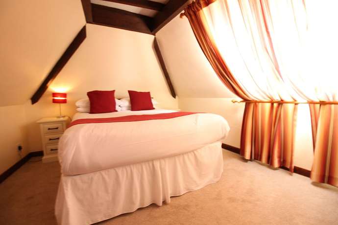 Imagen de la habitación del Hotel The Pilgrims. Foto 2