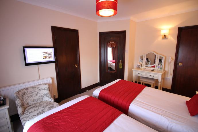 Imagen de la habitación del Hotel The Pilgrims. Foto 10