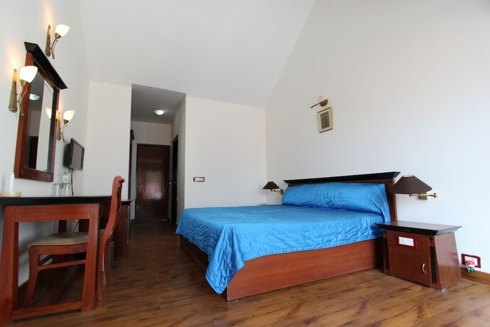 Imagen de la habitación del Hotel The Pine Crest. Foto 17