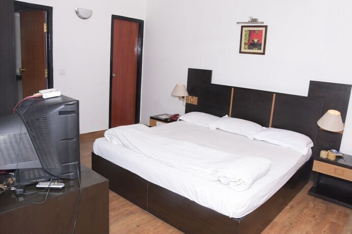 Imagen de la habitación del Hotel The Pine Crest. Foto 18