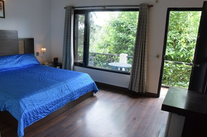 Imagen de la habitación del Hotel The Pine Crest. Foto 19