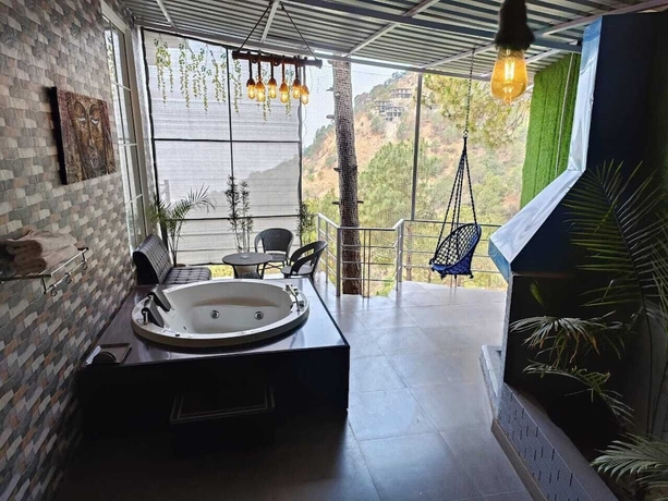 Imagen de la habitación del Hotel The Pine Paradise. Foto 12