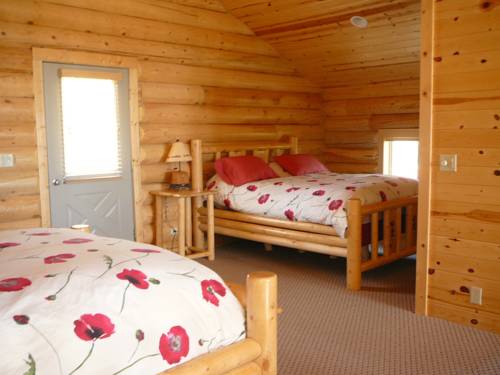 Imagen de la habitación del Hotel The Pines At Island Park. Foto 7