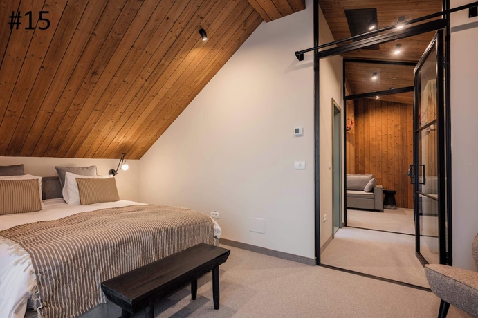 Imagen de la habitación del Hotel The Pines Bucegi Lodge. Foto 9