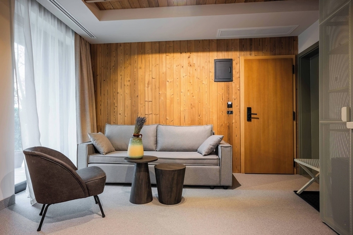 Imagen de la habitación del Hotel The Pines Bucegi Lodge. Foto 11