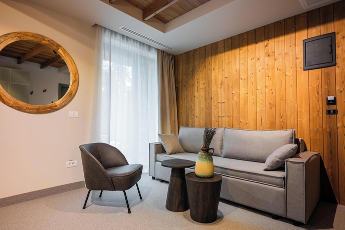 Imagen de la habitación del Hotel The Pines Bucegi Lodge. Foto 12