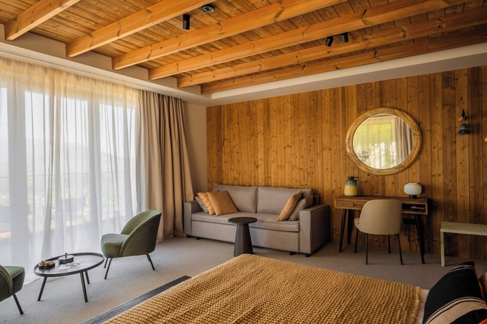 Imagen de la habitación del Hotel The Pines Bucegi Lodge. Foto 14