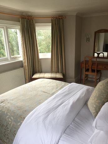 Imagen de la habitación del Hotel The Pines. Foto 10