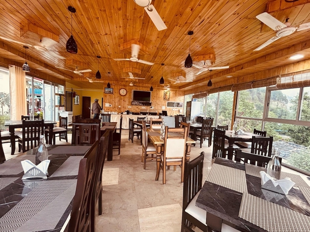 Imagen del bar/restaurante del Hotel The Pines Mountain View. Foto 3