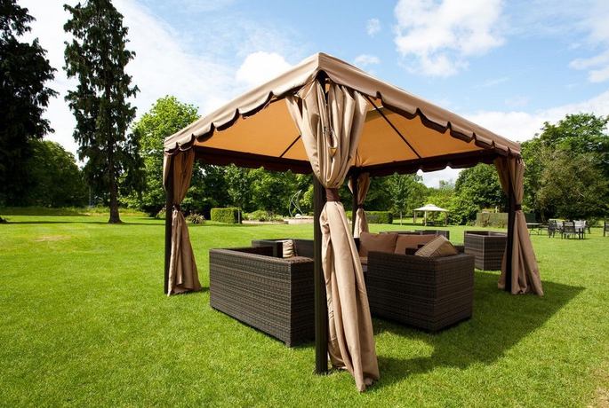 Imagen de los exteriores del Hotel The Pinewood. Foto 8