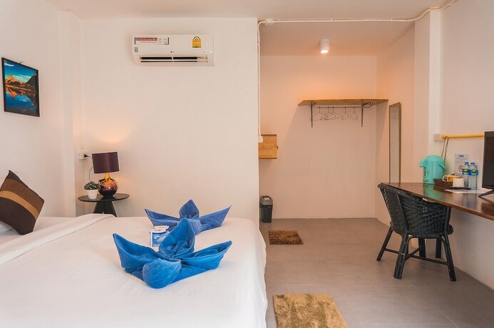 Imagen de la habitación del Hotel The Pink Homes. Foto 17
