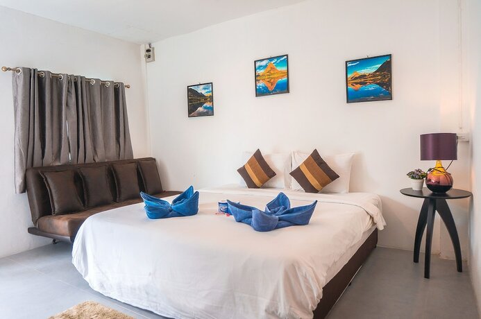 Imagen de la habitación del Hotel The Pink Homes. Foto 18