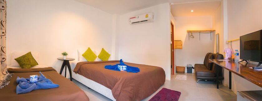 Imagen de la habitación del Hotel The Pink Homes. Foto 19