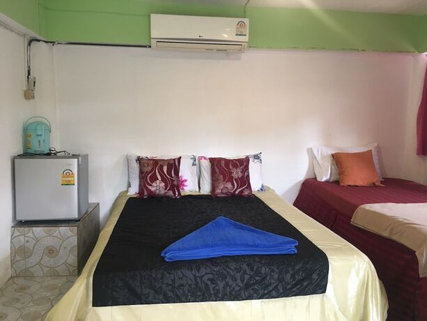 Imagen de la habitación del Hotel The Pink Homes. Foto 20