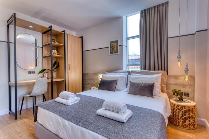 Imagen de la habitación del Hotel The Pinnacle Athens. Foto 5