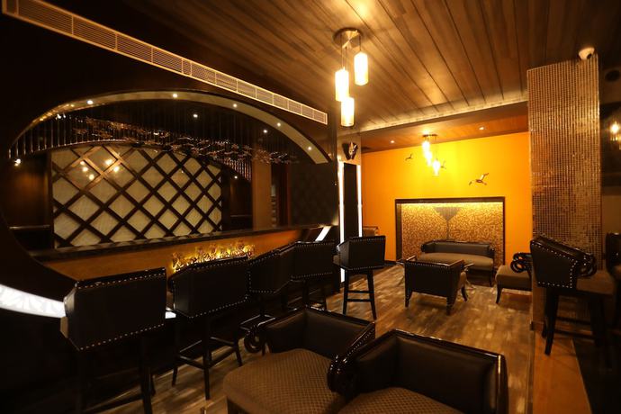 Imagen del bar/restaurante del Hotel The Pinnacle Inn Sarnath. Foto 4