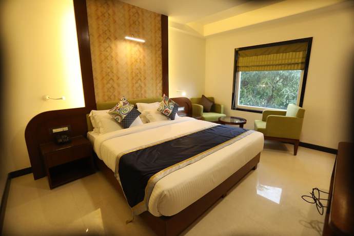 Imagen de la habitación del Hotel The Pinnacle Inn Sarnath. Foto 11