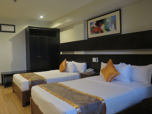 Imagen de la habitación del Hotel The Pinnacle and Suites. Foto 5