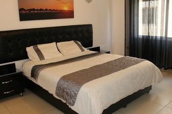 Imagen de la habitación del Hotel The Place Apartments. Foto 4