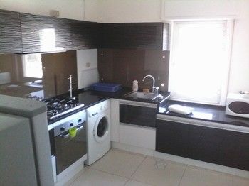 Imagen de la habitación del Hotel The Place Apartments. Foto 6