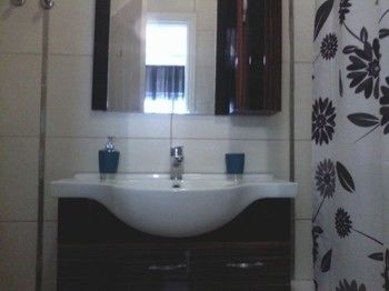 Imagen de la habitación del Hotel The Place Apartments. Foto 8