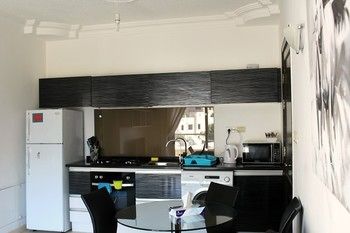 Imagen de la habitación del Hotel The Place Apartments. Foto 10