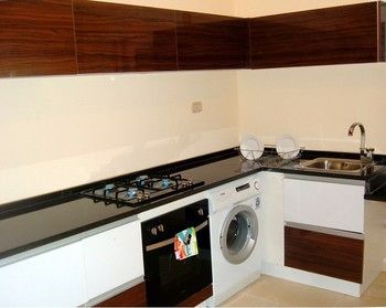 Imagen de la habitación del Hotel The Place Apartments. Foto 12