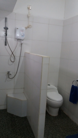 Imagen de la habitación del Hotel The Place Beach Bungalows. Foto 6