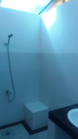Imagen de la habitación del Hotel The Place Beach Bungalows. Foto 8