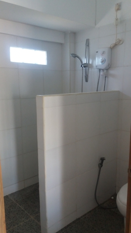 Imagen de la habitación del Hotel The Place Beach Bungalows. Foto 11