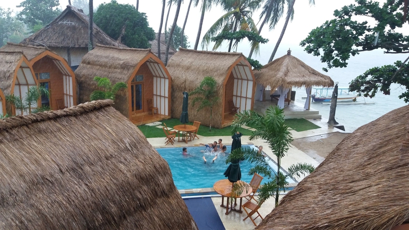 Imagen de la habitación del Hotel The Place Beach Bungalows. Foto 12