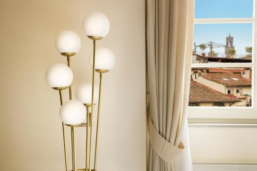 Imagen de la habitación del Hotel The Place Firenze. Foto 20