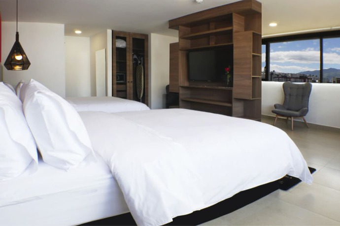 Imagen de la habitación del Hotel The Place, Quito. Foto 3