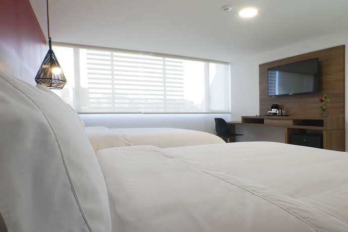 Imagen de la habitación del Hotel The Place, Quito. Foto 12