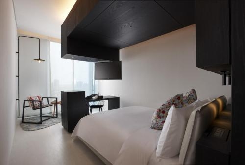 Imagen de la habitación del Hotel The Place Tainan. Foto 6