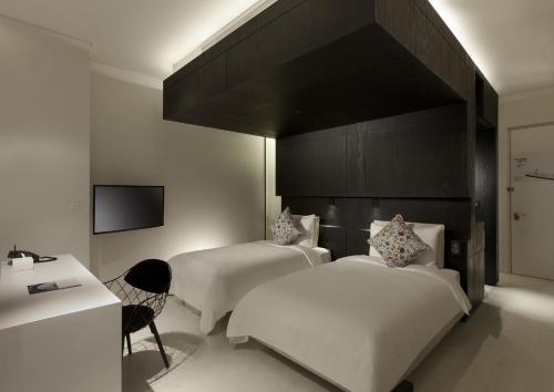 Imagen de la habitación del Hotel The Place Tainan. Foto 7