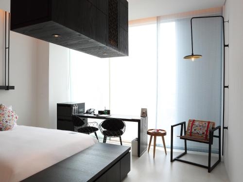 Imagen de la habitación del Hotel The Place Tainan. Foto 9