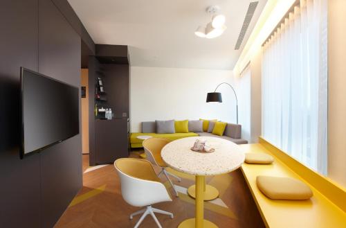 Imagen de la habitación del Hotel The Place Taipei. Foto 7