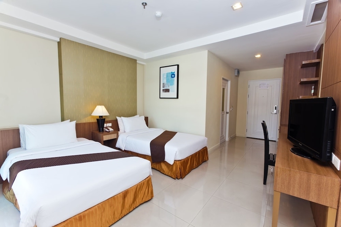 Imagen de la habitación del Hotel The Platinum Suite. Foto 2