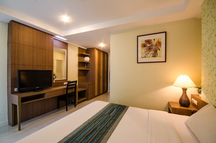 Imagen de la habitación del Hotel The Platinum Suite. Foto 3