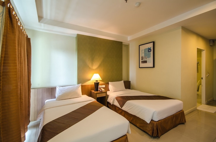 Imagen de la habitación del Hotel The Platinum Suite. Foto 9