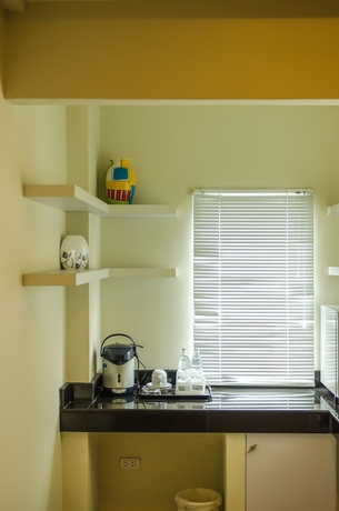 Imagen de la habitación del Hotel The Platinum Suite. Foto 10