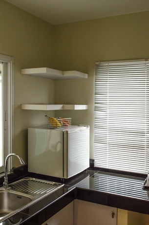 Imagen de la habitación del Hotel The Platinum Suite. Foto 15