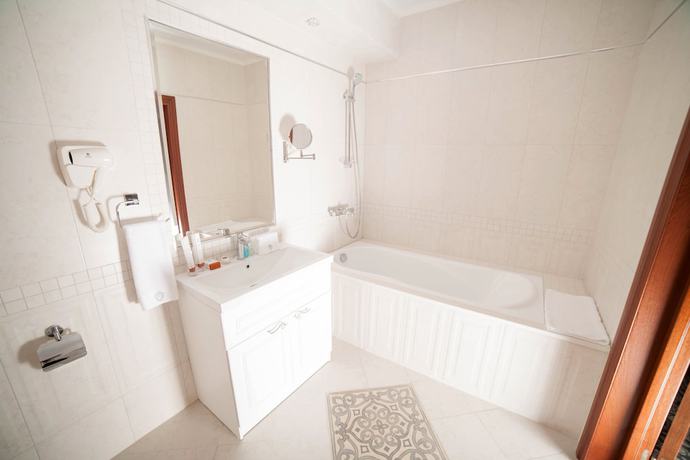 Imagen de la habitación del Hotel The Plaza, Almaty. Foto 2