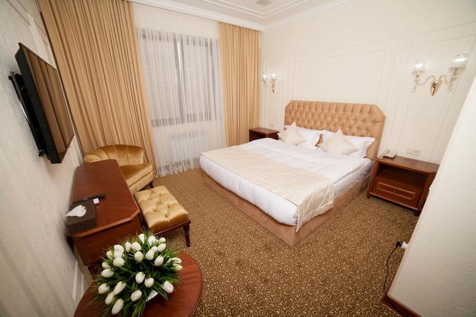 Imagen de la habitación del Hotel The Plaza, Almaty. Foto 6