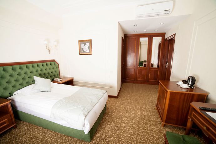 Imagen de la habitación del Hotel The Plaza, Almaty. Foto 9