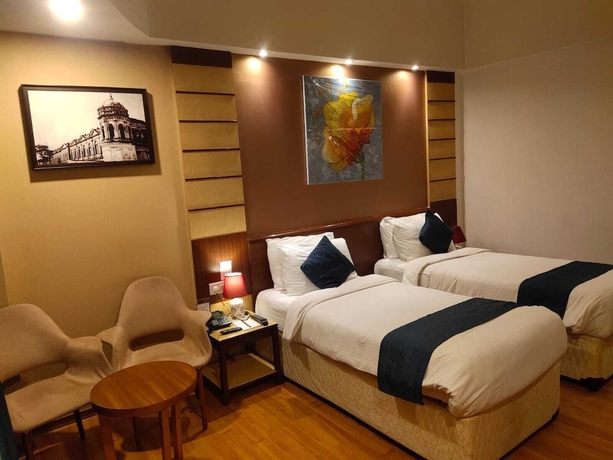 Imagen de la habitación del Hotel The Plaza, Hyderabad. Foto 5