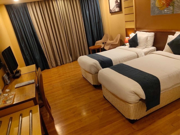 Imagen de la habitación del Hotel The Plaza, Hyderabad. Foto 9